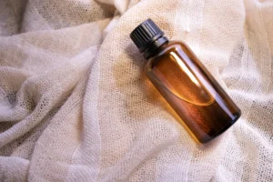 Mock-up amber glass bottles on natural background