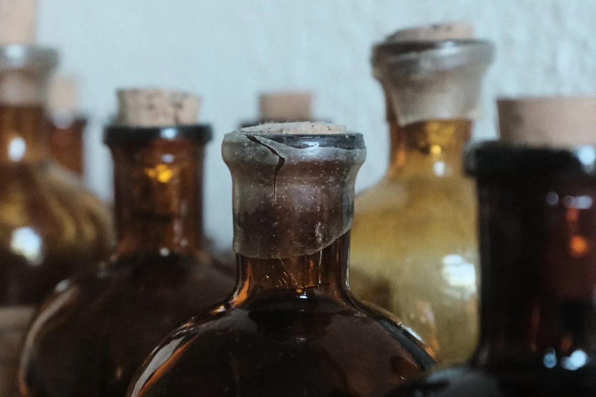A group of brown bottles sitting on top of a table