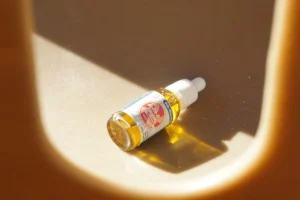 a bottle of sunflower seed oil sitting on a table