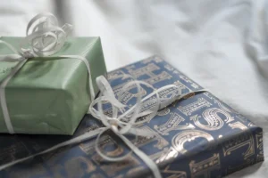 Two wrapped presents sitting on top of each other