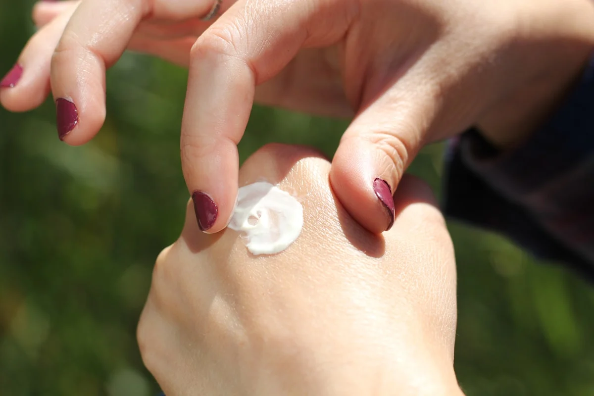 Cream on the back on a hand