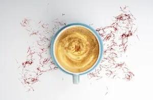 Indulge in the rich and exotic flavors of saffron with every sip of decadent Red Gold latte!"