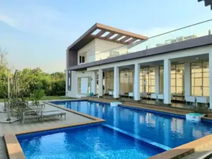 Luxurious tropical themed outdoor swimming pool