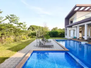 Luxurious tropical themed outdoor swimming pool
